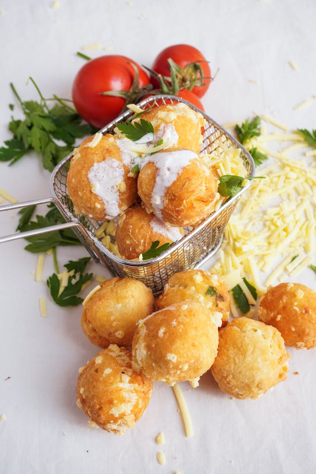Different variations of crispy mac and cheese balls with various coatings
