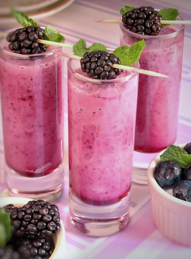 Fresh fruit smoothie in a glass jars