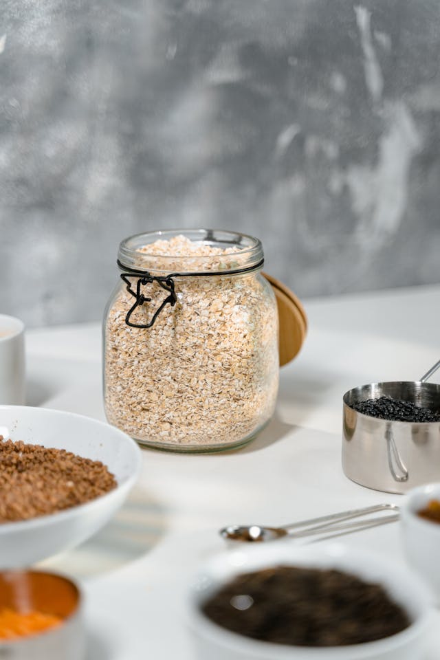 No-bake oatmeal energy bites stacked on white plate - healthy school lunchbox dessert for kids